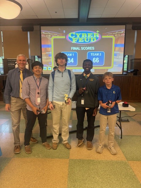 2nd Place went to the team from Loyola Blakefield. Pictured here with Steve Morrill from Loyola Blakefield.