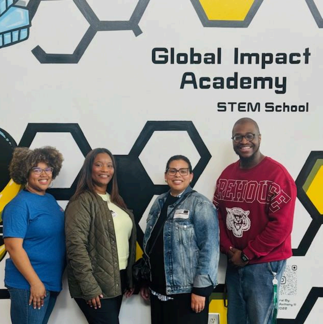 Members of the NCF Education Team visit with educators and students at Global Impact Academy STEM Magnet School in Georgia.