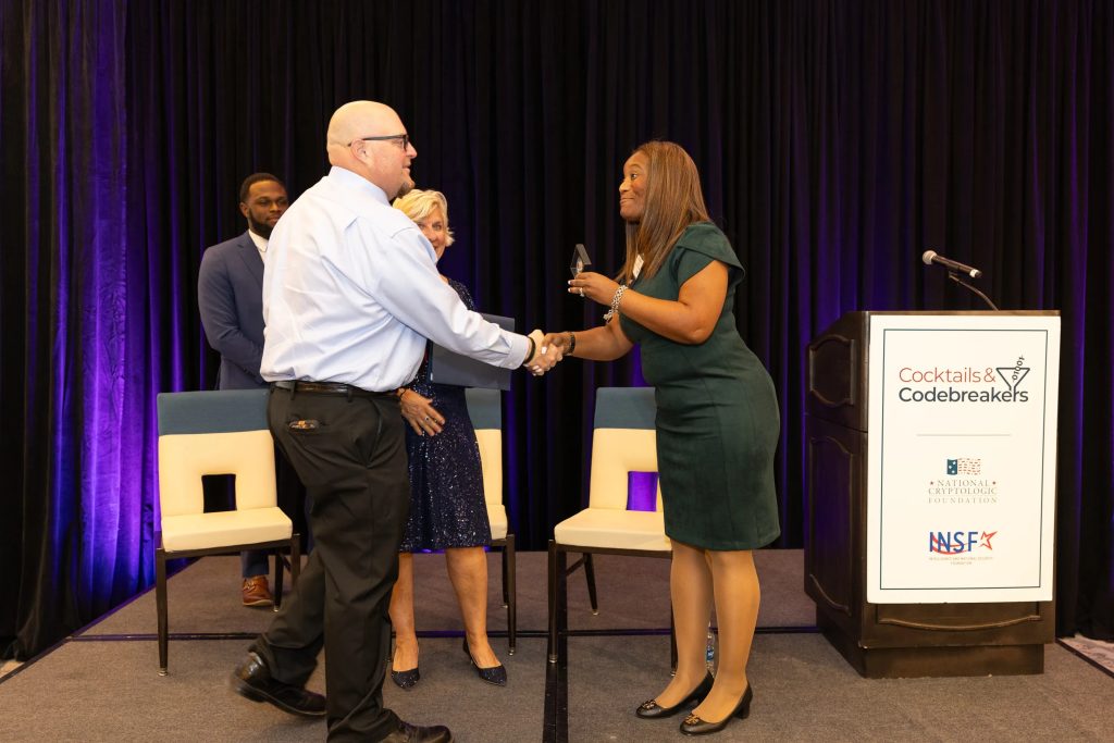 2024 Cocktails and Codebreakers - Educator Award for Mr. Daniel Rose - presented by NCF Education Director Alisha Jordan.